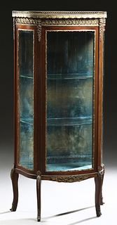 French Louis XV Style Ormolu Mounted Carved Mahogany Marble Top Vitrine, late 19th c., the brass bound brown marble top with a pierced 3/4 brass galle