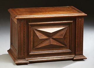 Diminutive French Provincial Carved Oak and Cherry Louis XIII Style Bedding Box, 19th c., the front with applied relief geometric decoration, flanked 