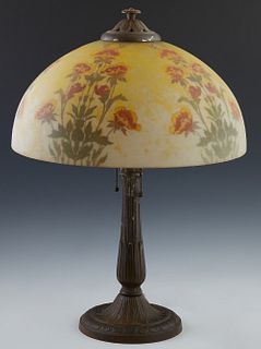 American Reverse Painted Patinated Spelter and Cast Iron Table Lamp, c. 1920, by the H. E. Rainaud Co., of Meriden Ct., the frosted reverse painted do