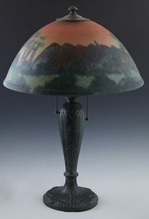 American Reverse Painted Chipped Ice Spelter Lamp, c. 1920, attributed to Handel, the dome shade with a reverse painted landcape with trees, on a tape