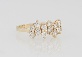 Lady's 14K Yellow Gold Dinner Ring, the top with six vertical rows containing two five point round diamonds each, total diamond wt.- .6 cts., Size 7,