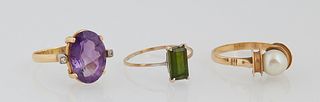 Group of Three Lady's 14K Yellow Gold Rings, one with a 7mm white cultured pearl, size 6 1/2; one with an oval 4.5 carat amethyst, size 7; the third w