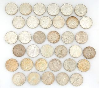 Group of Thirty-Five United States Peace Silver Dollars, consisting of 15- 1923P; 1- 1934S; 1- 1934D; 1- 1928P, 1- 1928S; 1- 1927S;  1- 1926D; 4- 1922