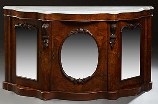 English Victorian Rosewood Grained Serpentine Walnut Credenza, c. 1850, the white ogee edge marble top above a central cupboard with an oval mirror do