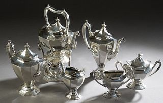 Reed and Barton Six Piece Silver Plated Tea and Coffee Service, early 20th c., in the "Sierra" pattern, # 3690, consisting of a hot water urn on a til