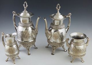 Meriden Four Piece Silver Plate Tea and Coffee Service, c. 1883, with aesthetic engraved decoration, consisting of a coffee pot, tea pot, creamer, and