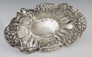 Sterling Art Nouveau Bread Bowl, early 20th c., by Mauser, #621, with repousse floral and C-scroll decoration, H.- 2 1/4 in., W.- 14 3/8 in., D.- 8 1/