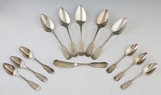 Twelve Pieces of H. P. Buckley Coin Silver, mid 19th c., New Orleans, consisting of 5 soup spoons, 6 teaspoons and a master butter knife, each marked 