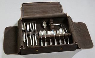 Fifty-Three Piece Set of Sterling Flatware, 1956, by Gorham, in the "Celeste" pattern, consisting of 9 butter spreaders, 8 dinner forks, 8 salad forks