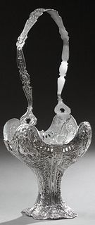 Large Continental Louis XV Silver Plated Open Basket, 20th c., with ornate relief decoration of a dancing couple in 19th c. costumes amidst flowers, f