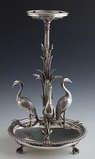 English Silverplated Centerpiece, late 19th c., with a Victorian registration mark, with a central bowl stand on a reeded leaf decorated support, flan