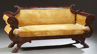 American Federal Style Carved Mahogany Settee, 19th c. the curved end crest rail over an upholstered back and partially upholstered cornucopia arms, t
