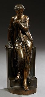 After Eugene Antoine Aizelin (1821-1902, French), "Entering the Bath," patinated bronze portraying a young woman in classical loose robes descending t