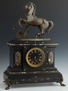 Patinated Spelter and Marble Mantel Clock, c. 1880, by A. D. Mougin, the top with a figure of a rearing horse, on a marble base with incised decoratio