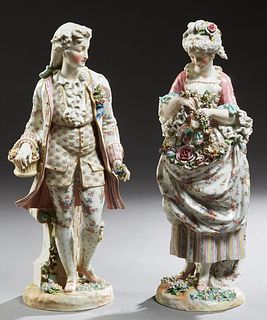 Pair of Large Meissen Style Polychromed Biscuit Porcelain Figures, 19th c., of a couple on 19th c. costume, she with an apron filled with flowers, he 