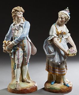 Pair of Large Continental Porcelain Figures, 19th c., of a male and female gardener in 19th c. costume, he with a watering can, she with a basket of f