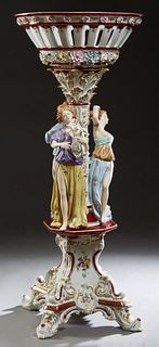 Large Meissen Style Gilt Decorated Polychromed Figural Porcelain Pedestal Jardiniere, 20th c., with a magenta ground, the relief floral decorated reti