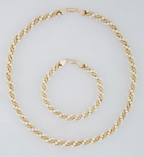 14K Yellow Gold Set, of a necklace and matching bracelet, consisting of a twisted strand with 3.4mm cultured pearls, entwined with a twisted gold wire
