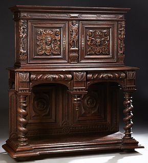 Exceptional French Provincial Carved Oak Sideboard, c. 1880, the stepped crown over double doors with high relief hand carving flanking a pilaster wit