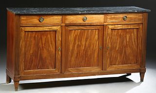 French Louis XVI Style Carved Mahogany Marble Top Sideboard, 20th c., the highly figured black marble over three frieze drawers above three cupboard d