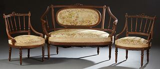French Three Piece Louis XVI Style Carved Mahogany Parlor Suite, early 20th c., Honore Dufin, consisting of a settee and two fauteuils, the settee wit