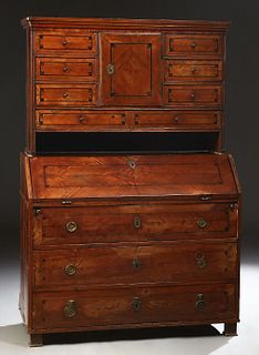 Continental Inlaid Walnut Secretary Bookcase, mid 19th c., perhaps Dutch, with a stepped rounded corner crown over a large central cupboard door above