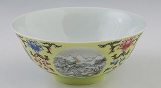 Oriental Porcelain Rice Bowl, 19th c., with floral and landscape panel decoration on a yellow ground, the interior with a central floral reserve, the 