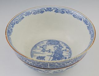 Chinese Blue & White Porcelain Bowl, 19th c, the interior with a blue floral banded rim and a reserve of a woman in a landscape, the exterior with a w