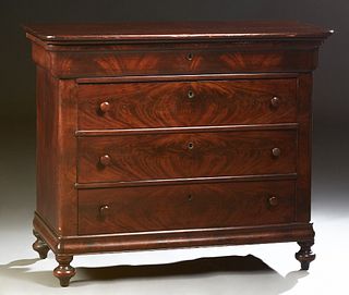 French Louis Philippe Style Carved Mahogany Commode, 19th c., the stepped rounded corner top over a cavetto frieze drawer and three deep drawers, on a