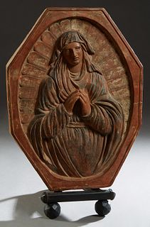 Continental School, "The Virgin Mary at Prayer," early 20th c., octagonal terracotta relief plaque, on a custom iron stand, Plaque- H.- 21 1/4 in., W.