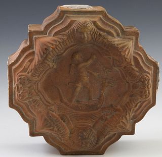 French Terracotta Architectural Fragment, 19th c., the shaped plaque with a central relief of a putto slaying a serpent, flanked by a border with two 