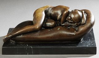 After Ferdinand Preiss (1882-1943), "Sleeping Nude," 21st c., patinated bronze on a black marble base, signed verso, H.- 5 3/4 in., W.- 13 in., D.- 7 