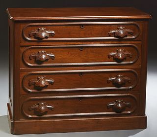 American Late Victorian Carved Walnut Chest, c. 1880, the ogee edge top over a shallow frieze drawer, above three deeper drawers, all with leaf carved