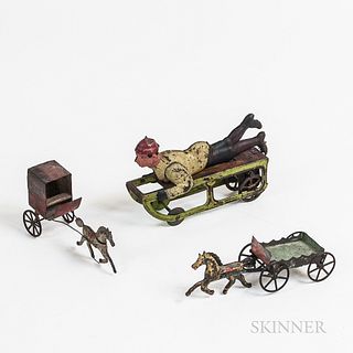 Pressed Steel Sledding Wind-up Toy and Two Tin Horses and Carriages