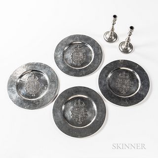 Four Pedraza Pewter Plates and a Pair of Candlesticks