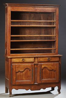 French Provincial Louis XV Style Carved Cherry Vaisselier, 19th c., the rounded corner ogee crown over a back with three plate racks, on a rounded cor