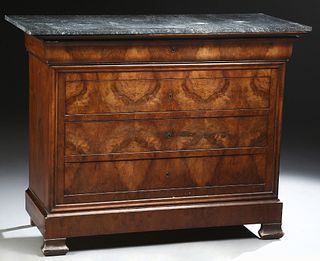 French Louis Philippe Carved Walnut Marble Top Commode, 19th c., the highly figured grey marble top over a cavetto frieze drawer and three deep drawer