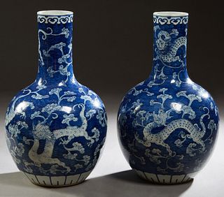 Pair of Large Chinese Blue & White Porcelain Baluster Vases, 20th c., the tall necks over dragon and cloud decorated sides, H.- 23 in., Dia.- 14 in. P