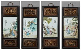 Set of Four Chinese Carved Giltwood Plaques, late 19th c., with relief carved giltwood panels above and below inset hand painted porcelain plaques wit