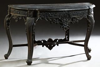 Victorian Style Cast Iron Demilune Console Table, 21st c., the stepped shaped demilune top over a pierced floral relief skirt, on scrolled cabriole le
