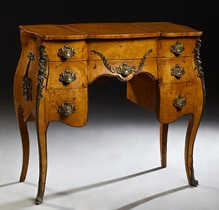Louis XV Style Burled Elm Ormolu Mounted Burled Elmwood Bombe Lift Top Vanity, 20th c., the lifting center lid with an arched wide beveled mirror, ove