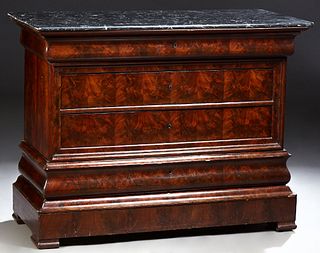 French Empire Style Carved Mahogany Marble Top Commode, 19th c., the rounded edge and corner highly figured black marble over a cavetto frieze drawer 