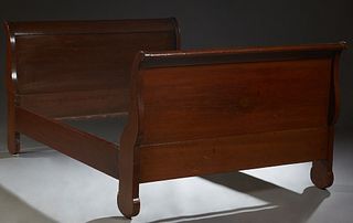 French Louis Philippe Carved Mahogany Double Sleigh Bed, 19th c., the curved sleigh ends joined by wooden rails, H.- 38 3/4 in., Int. w.- 54 in., Int.