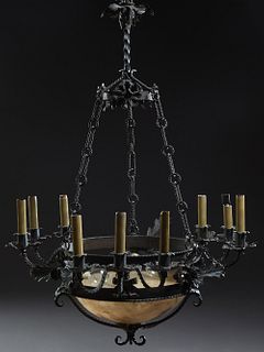 Art Deco Style Wrought Iron and Alabaster Twelve Light Chandelier, early 20th c., the large alabaster bowl suspended from a leaf mounted iron band, is