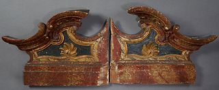 Pair of Carved and Polychromed Broken Arch Architectural Elements, 19th c., in original paint with gilt highlights, Each- H.- 20 1/2 in., W.- 27 in., 