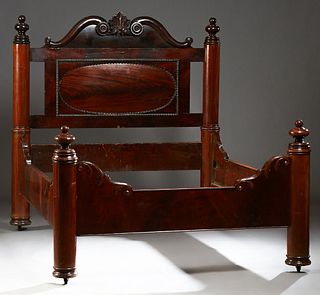 American Rococo Carved Mahogany Cut Down Tester Double Bed, mid 19th c., the arched headboard with a central carved leaf, over an oval panel, flanked 