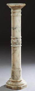 Continental Carved Marble Pedestal, early 20th c., the octagonal top on a turned support, to a stepped octagonal base, H.- 41 3/4 in., W.- 11 in., D.-