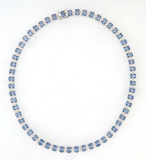 14K White Gold Link Necklace, each of the 56 links with two horizontal blue sapphires, flanked on one side by two round diamonds, total sapphire wt.- 