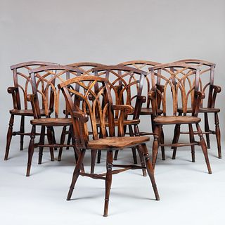 Assembled Set of Eight Neo-Gothic Elm Windsor Armchairs