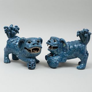 Pair of Chinese Robin's Egg Glazed Porcelin Models of Buddhistic Lions and Pups